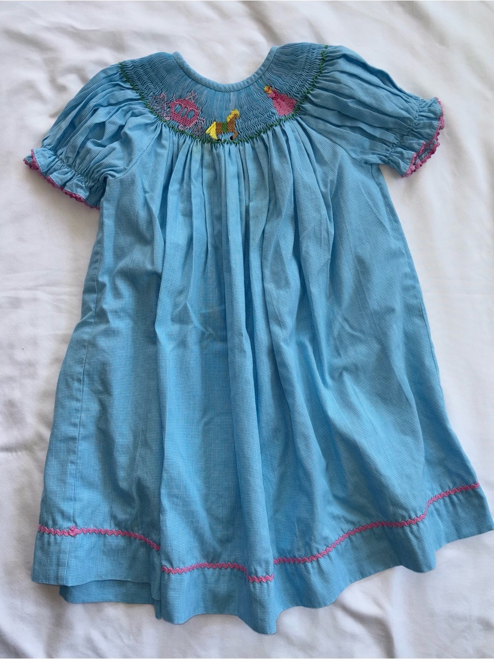 Girls' Light Blue Smocked Dress with Princess, carriage, and horse and Pink Trim